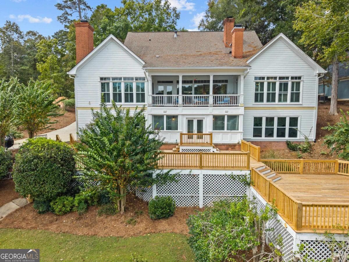 6 bedroom, 4.5 bathroom, 6,120 sq ft single family residence for sale at 1651 Lighthouse Circle, Greensboro, GA 30642 — photo 5