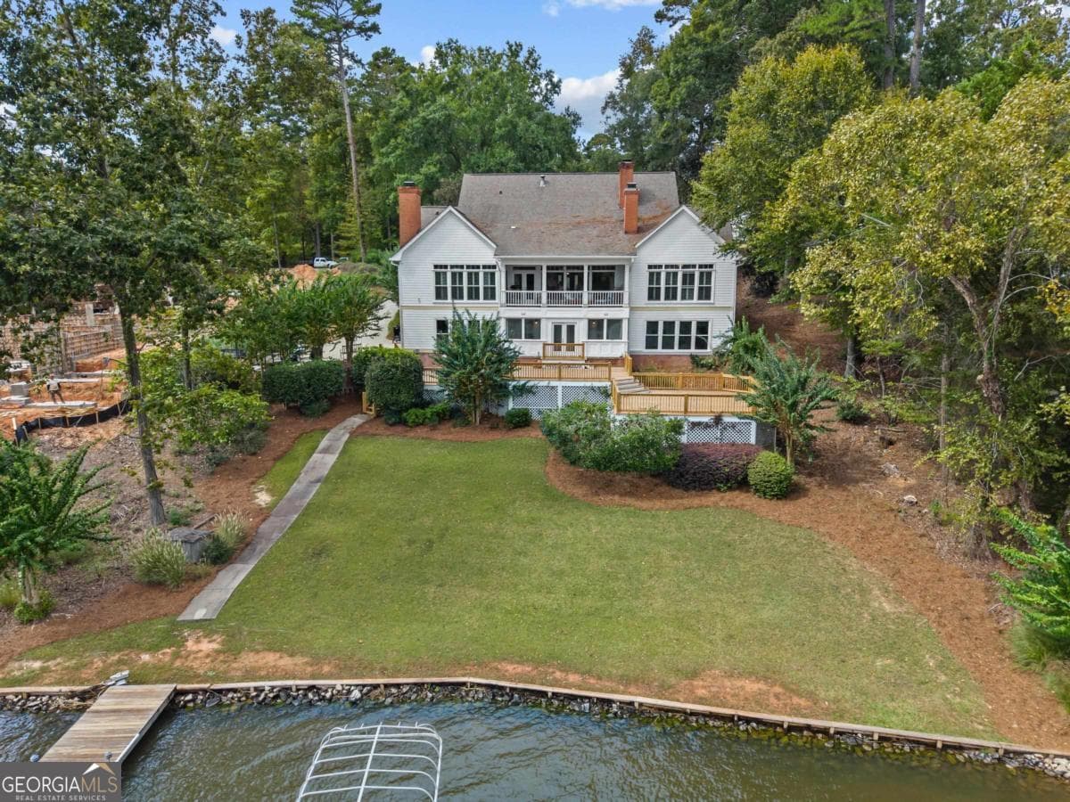 6 bedroom, 4.5 bathroom, 6,120 sq ft single family residence for sale at 1651 Lighthouse Circle, Greensboro, GA 30642 — photo 8