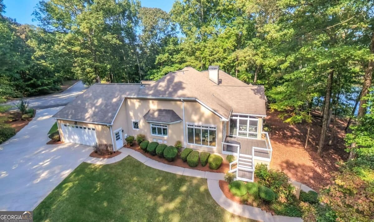 4 bedroom, 4.5 bathroom, 5,293 sq ft single family residence for sale at 320 Laurel Lakes Drive, Carrollton, GA 30116 — photo 5