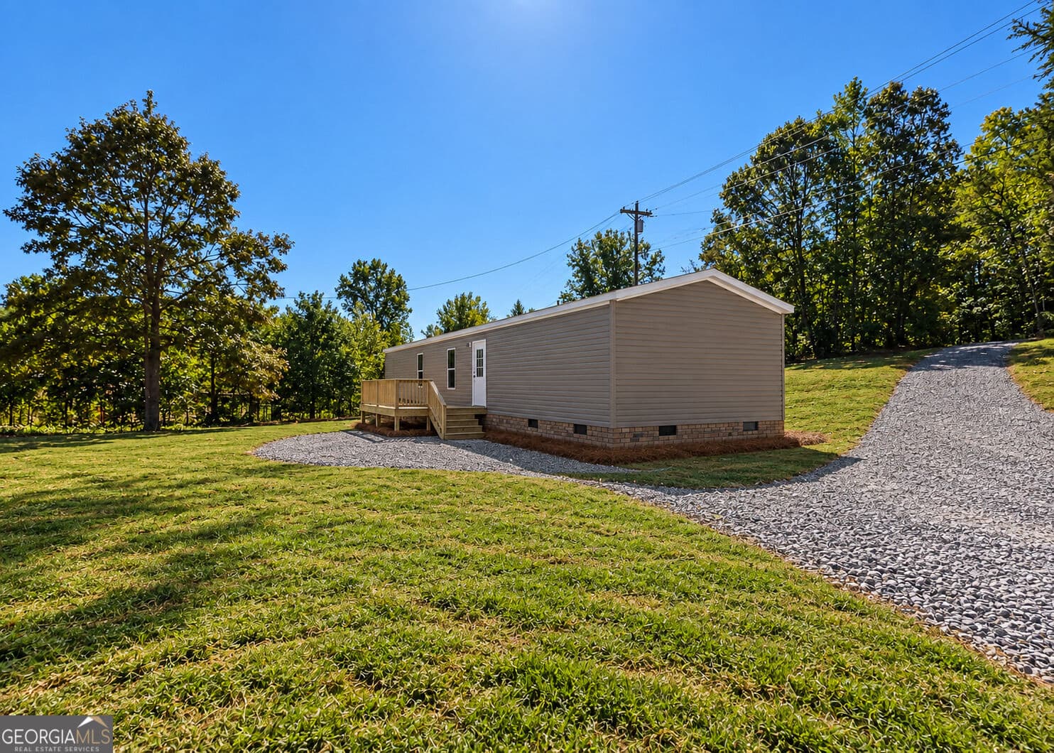 2 bedroom, 2 bathroom, 980 sq ft manufactured home,single family residence for sale at 6050 Gumlog Road, Martin, GA 30557 — photo 2