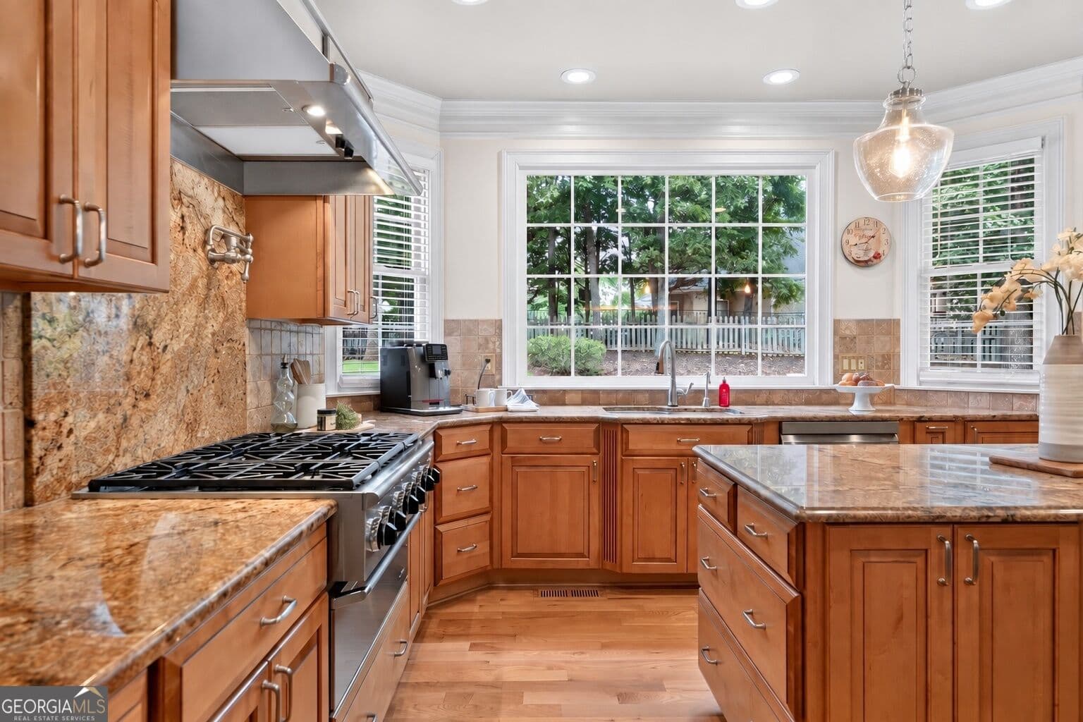 6 bedroom, 4.5 bathroom, 4,800 sq ft single family residence for sale at 5490 Hampstead Way, Johns Creek, GA 30097 — photo 2