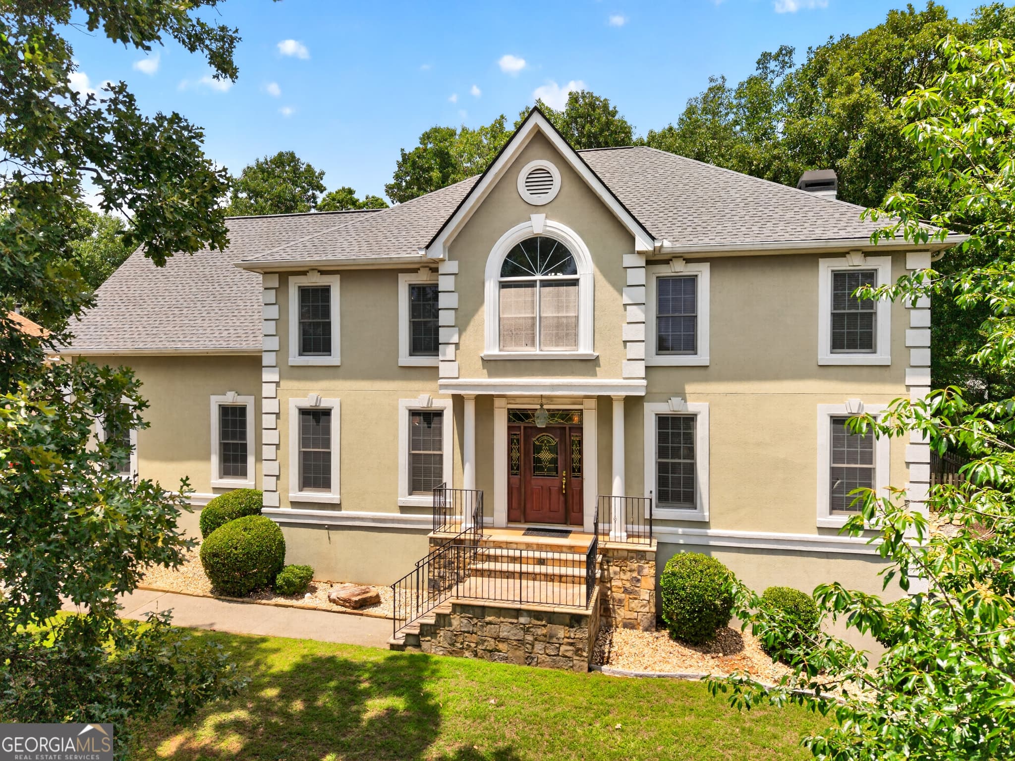 6 bedroom, 4.5 bathroom, 4,800 sq ft single family residence for sale at 5490 Hampstead Way, Johns Creek, GA 30097
