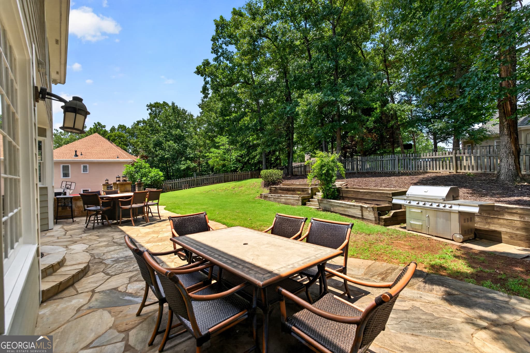 6 bedroom, 4.5 bathroom, 4,800 sq ft single family residence for sale at 5490 Hampstead Way, Johns Creek, GA 30097 — photo 5