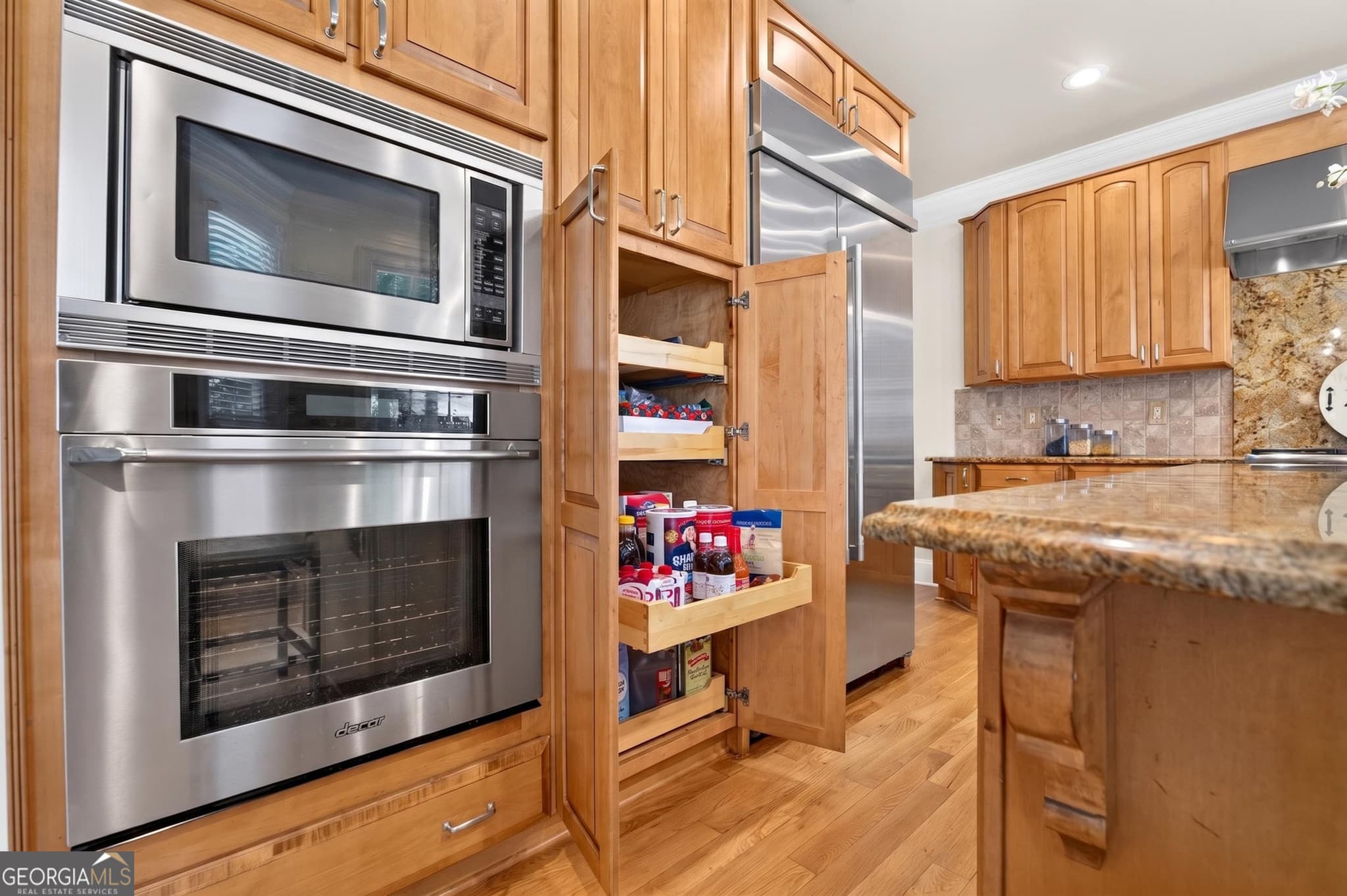 6 bedroom, 4.5 bathroom, 4,800 sq ft single family residence for sale at 5490 Hampstead Way, Johns Creek, GA 30097 — photo 10