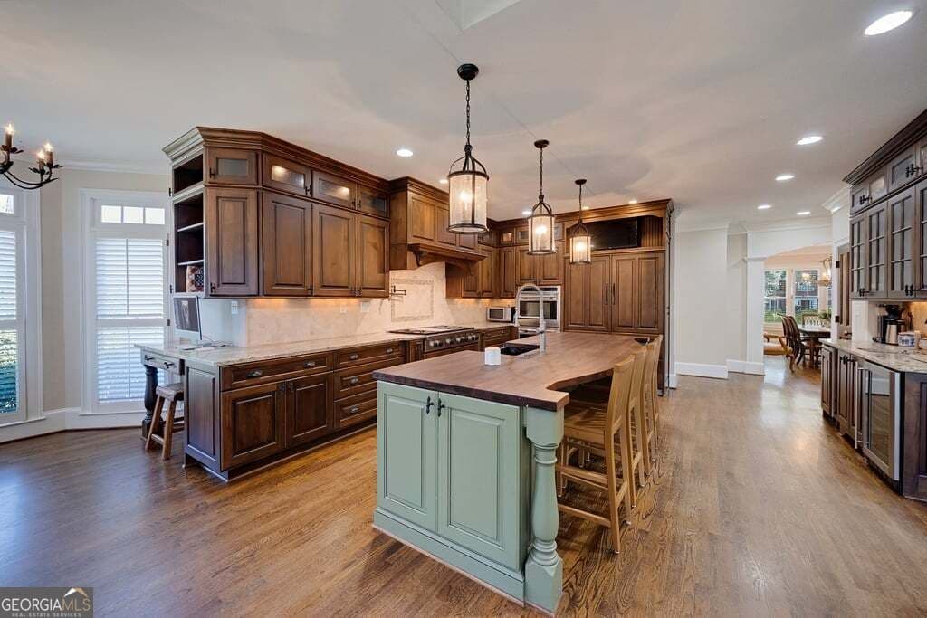 5 bedroom, 4.5 bathroom, 5,484 sq ft single family residence for sale at 4169 Riverview Drive, Peachtree Corners, GA 30097 — photo 3