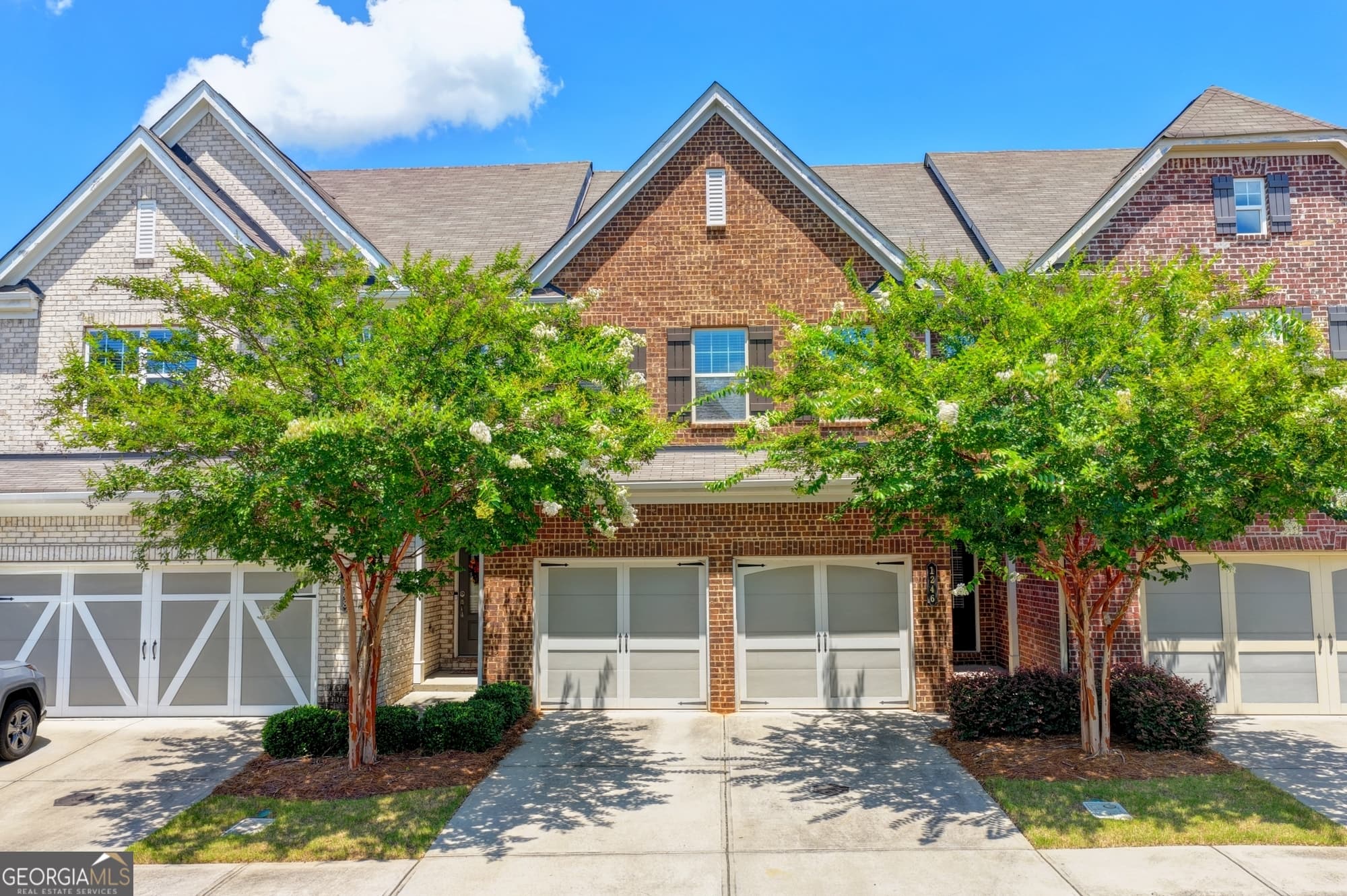 4 bedroom, 3.5 bathroom, 2,760 sq ft townhouse for sale at 1246 Foxcroft Lane, Cumming, GA 30041