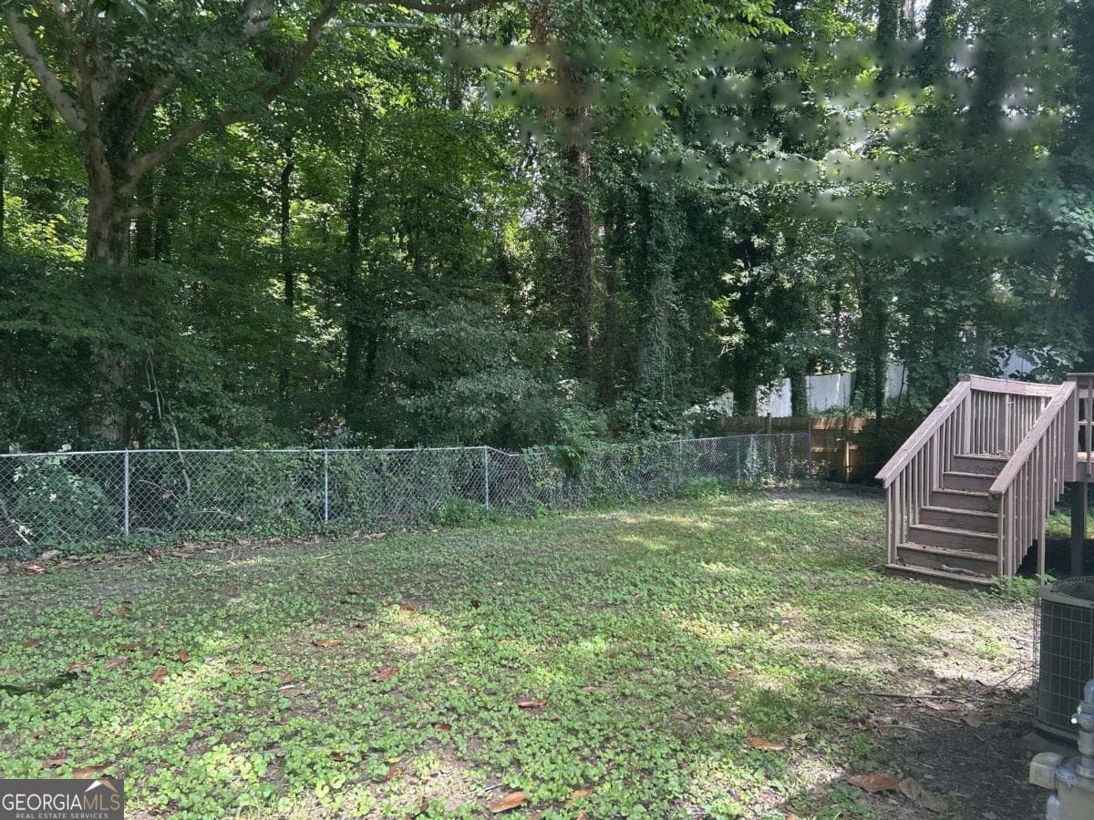 3 bedroom, 2 bathroom, 1,100 sq ft single family residence for sale at 2740 Santa Barbara Drive, Atlanta, GA 30318 — photo 2