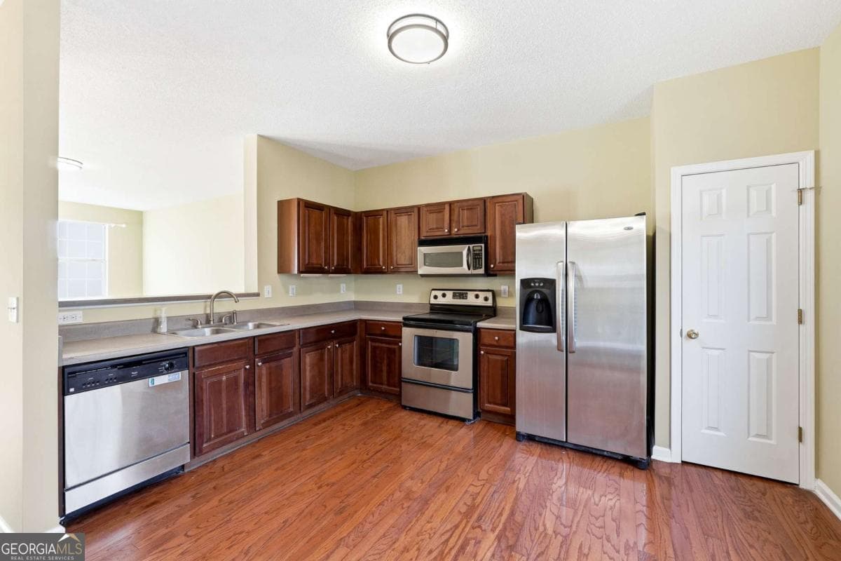 4 bedroom, 3.5 bathroom townhouse for sale at 412 Heritage Park Trace 22, Kennesaw, GA 30144 — photo 8