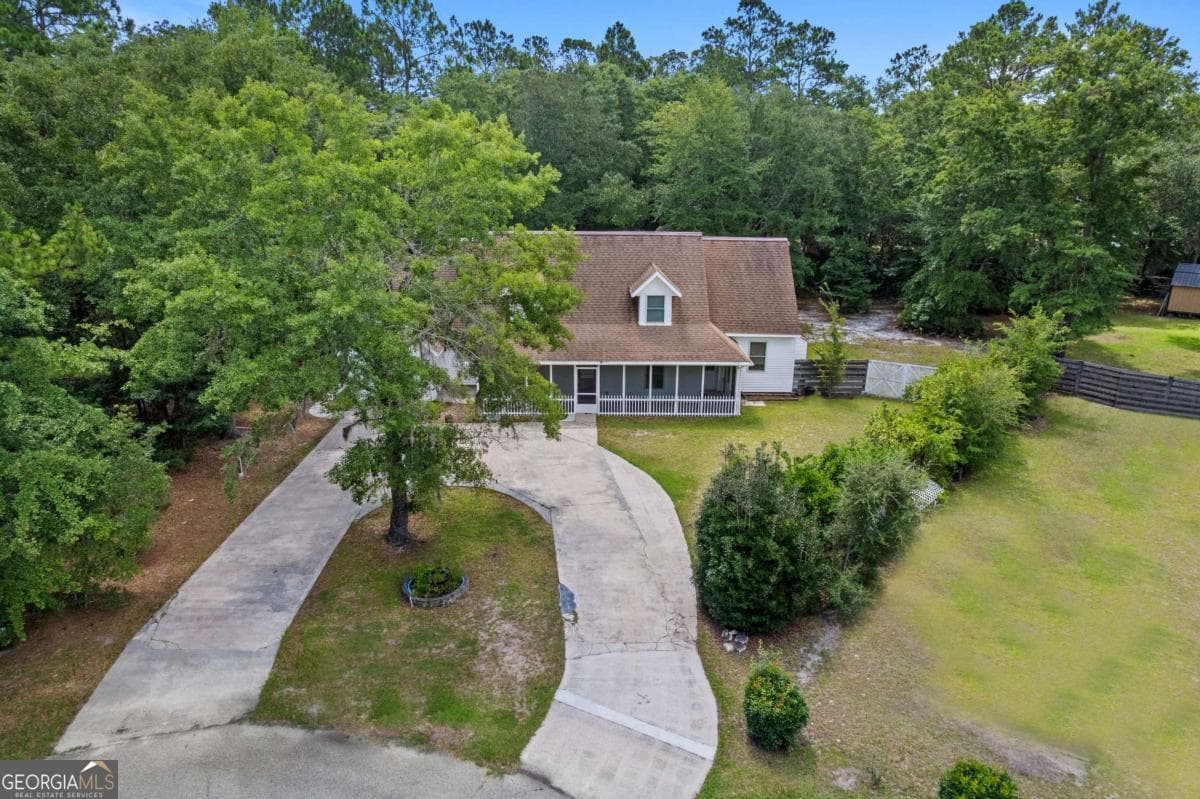 5 bedroom, 4 bathroom, 3,666 sq ft single family residence for sale at 157 Ole Oak Road, Allenhurst, GA 31301 — photo 3