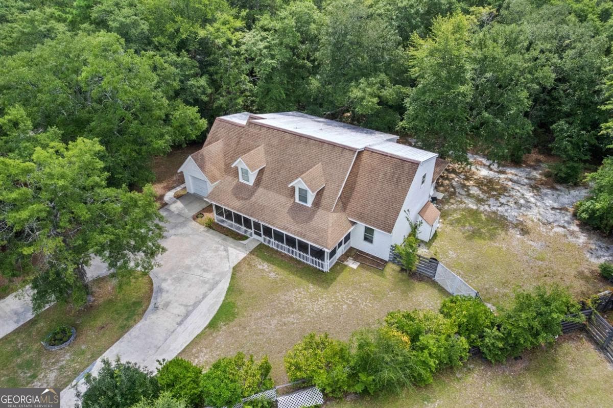 5 bedroom, 4 bathroom, 3,666 sq ft single family residence for sale at 157 Ole Oak Road, Allenhurst, GA 31301 — photo 5