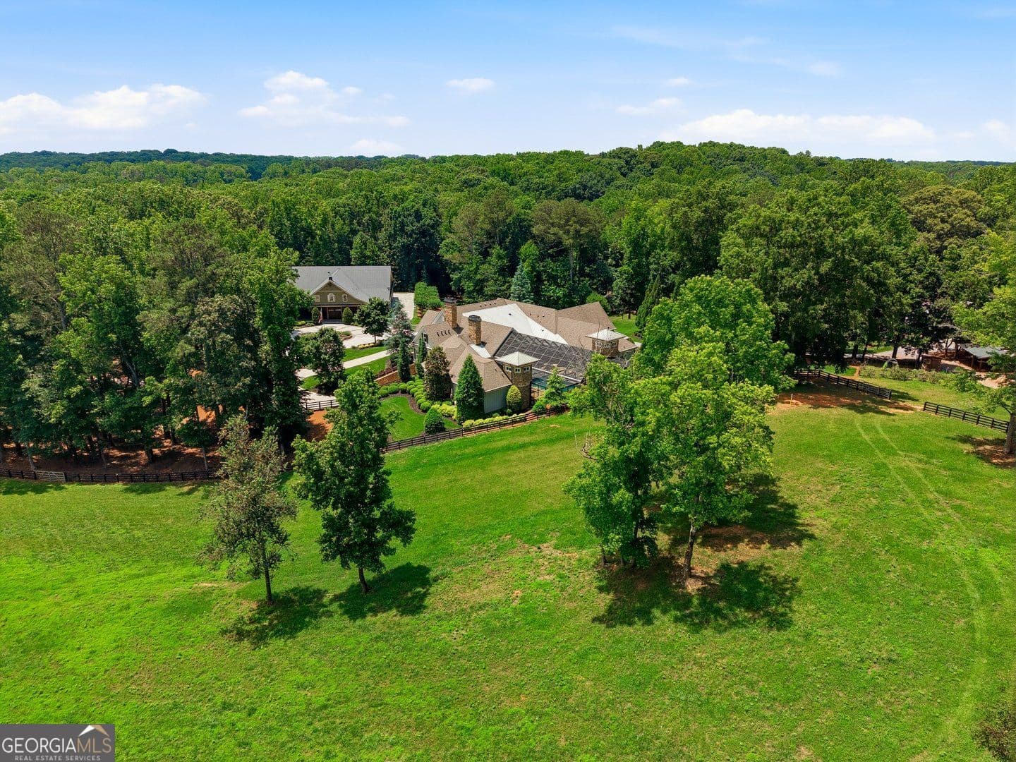 6 bedroom, 7 bathroom, 13,672 sq ft single family residence for sale at 5135 Howard Road, Cumming, GA 30040 — photo 2