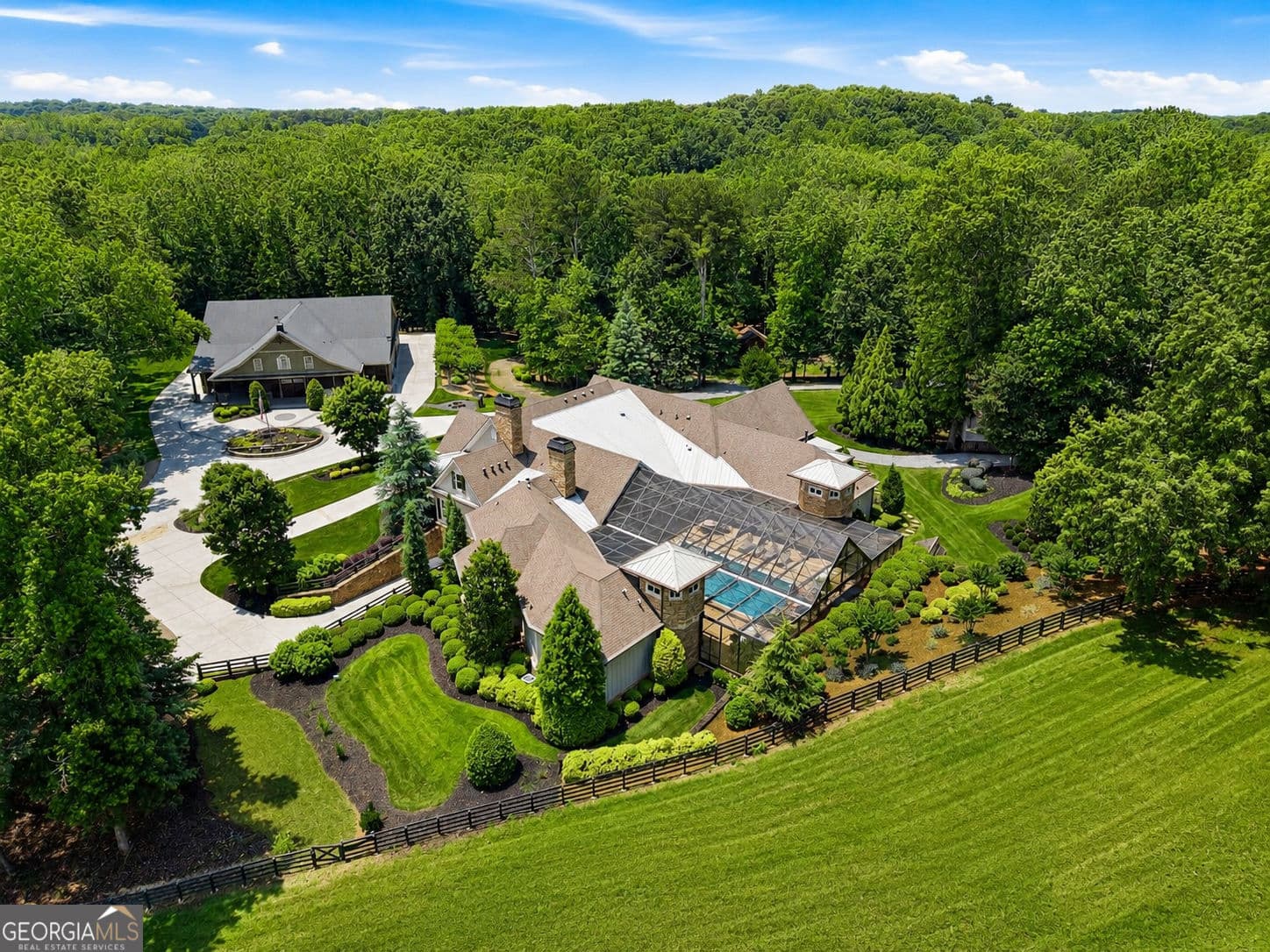 6 bedroom, 7 bathroom, 13,672 sq ft single family residence for sale at 5135 Howard Road, Cumming, GA 30040