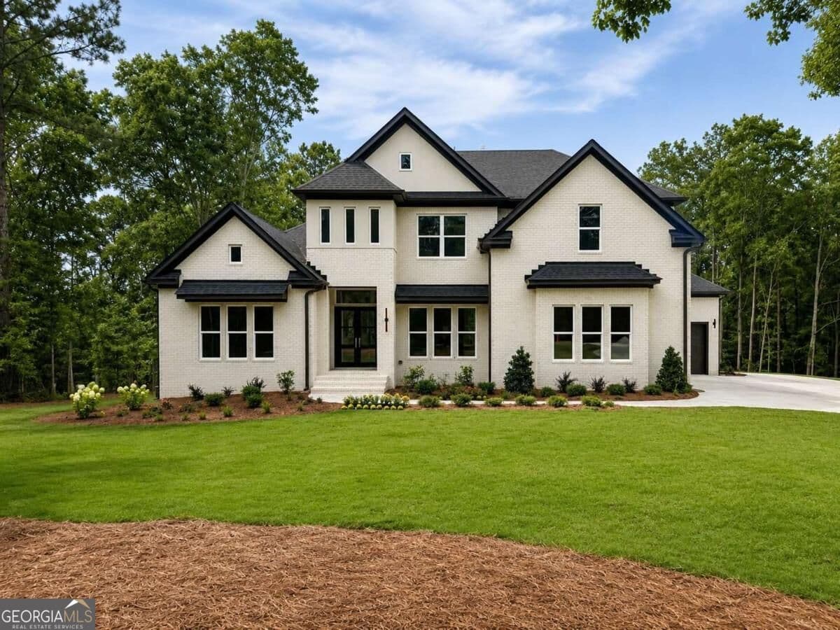 4 bedroom, 4.5 bathroom single family residence for sale at 1290 New Hope Church Road 5, Loganville, GA 30052 — photo 2