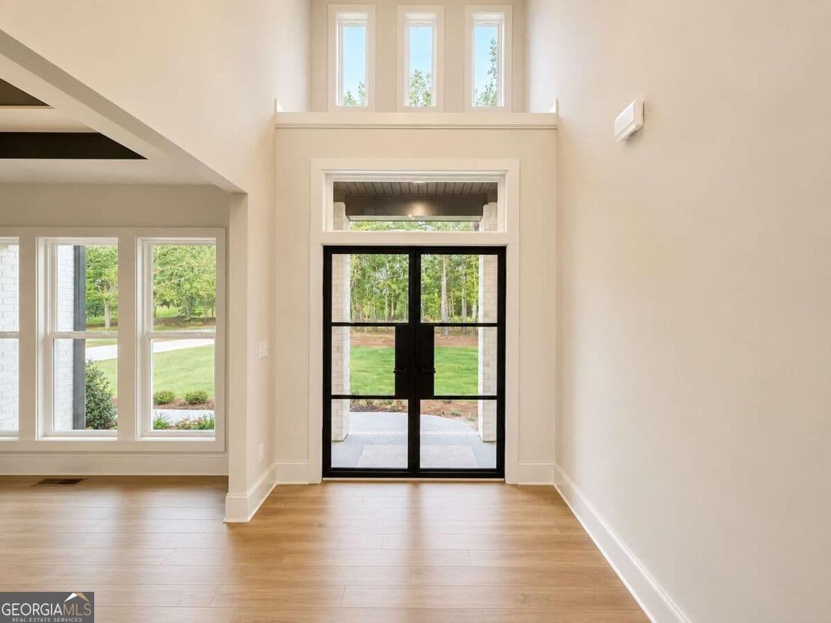 4 bedroom, 4.5 bathroom single family residence for sale at 1290 New Hope Church Road 5, Loganville, GA 30052 — photo 4