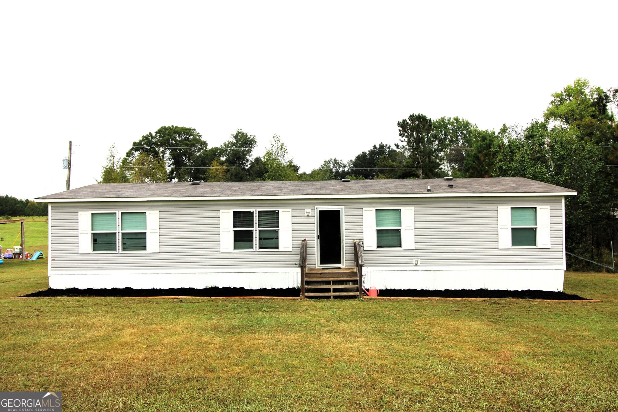 4 bedroom, 2 bathroom, 1,568 sq ft manufactured home,single family residence for sale at 231 Canady Bridge Road, Twin City, GA 30471