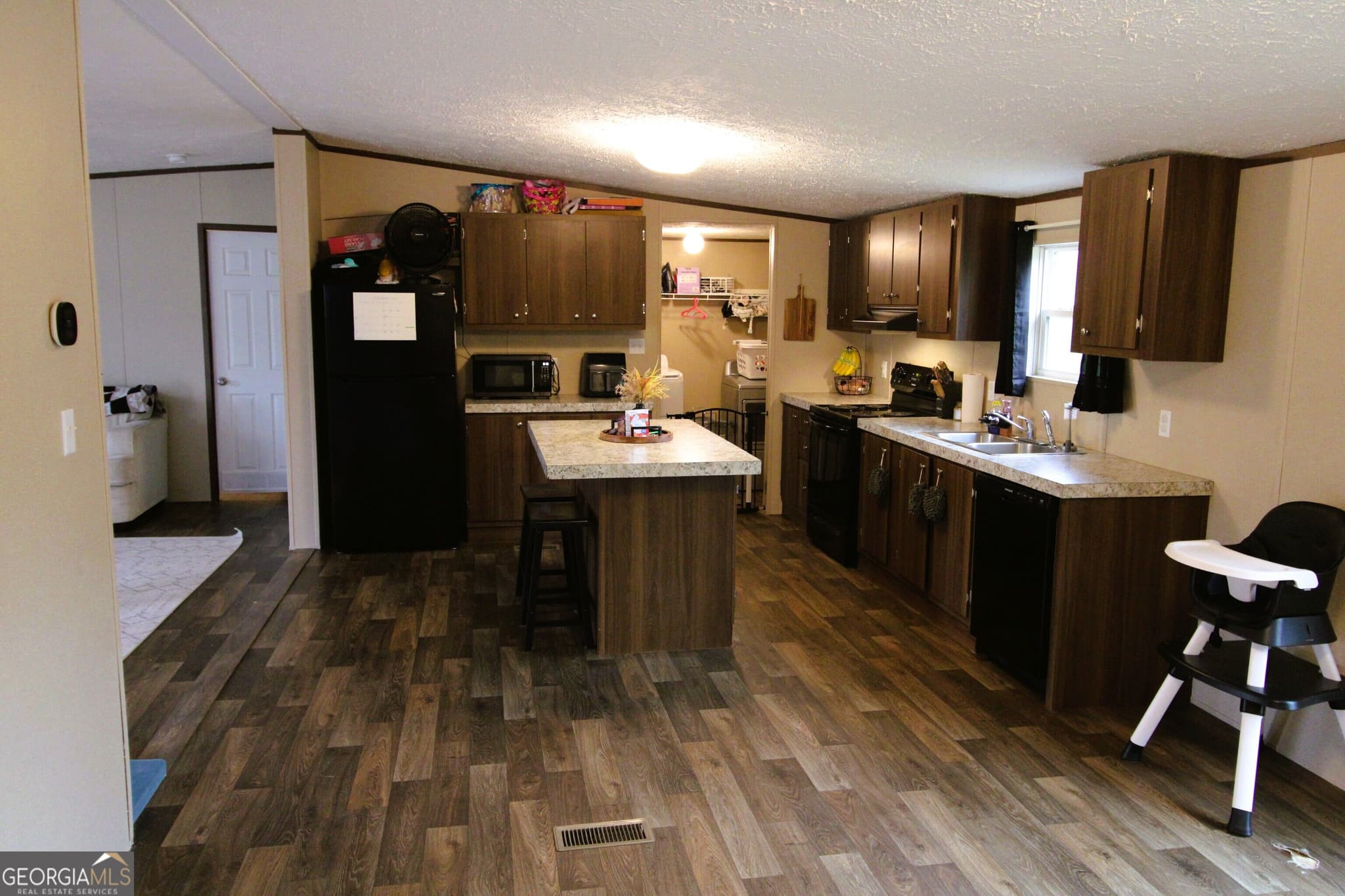 4 bedroom, 2 bathroom, 1,568 sq ft manufactured home,single family residence for sale at 231 Canady Bridge Road, Twin City, GA 30471 — photo 4