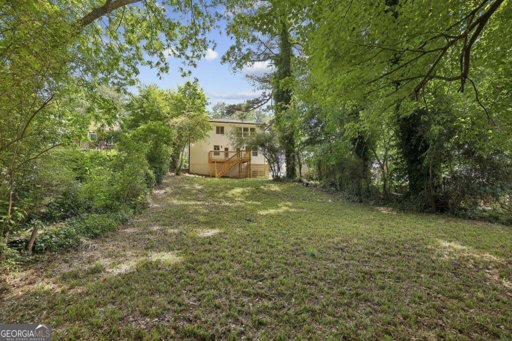 5 bedroom, 4 bathroom, 3,000 sq ft single family residence for sale at 1755 Emerald Avenue, Atlanta, GA 30310 — photo 7