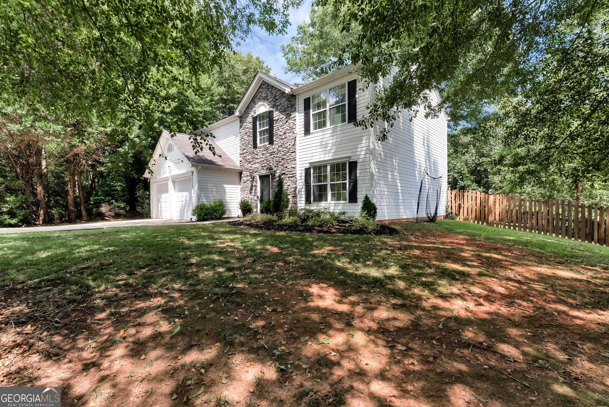 4 bedroom, 2.5 bathroom, 2,152 sq ft single family residence for sale at 4205 Ridgebrook Bend, Cumming, GA 30028 — photo 2
