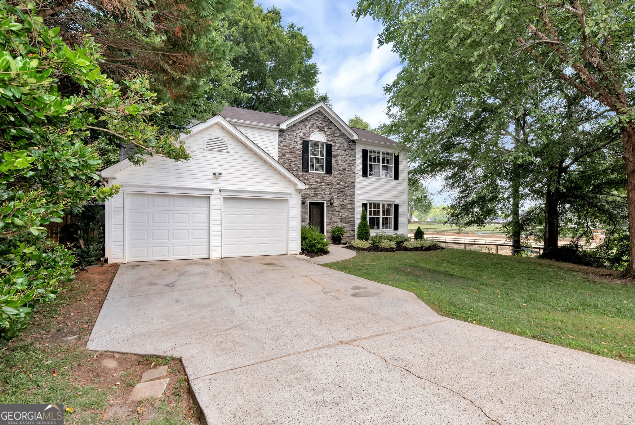 4 bedroom, 2.5 bathroom, 2,152 sq ft single family residence for sale at 4205 Ridgebrook Bend, Cumming, GA 30028 — photo 1 of 31