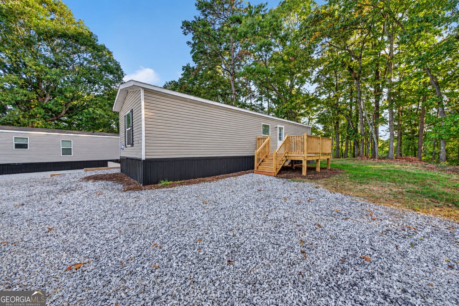 2 bedroom, 1 bathroom, 877 sq ft manufactured home,single family residence for sale at 61 Bennys Drive, Cleveland, GA 30528 — photo 2