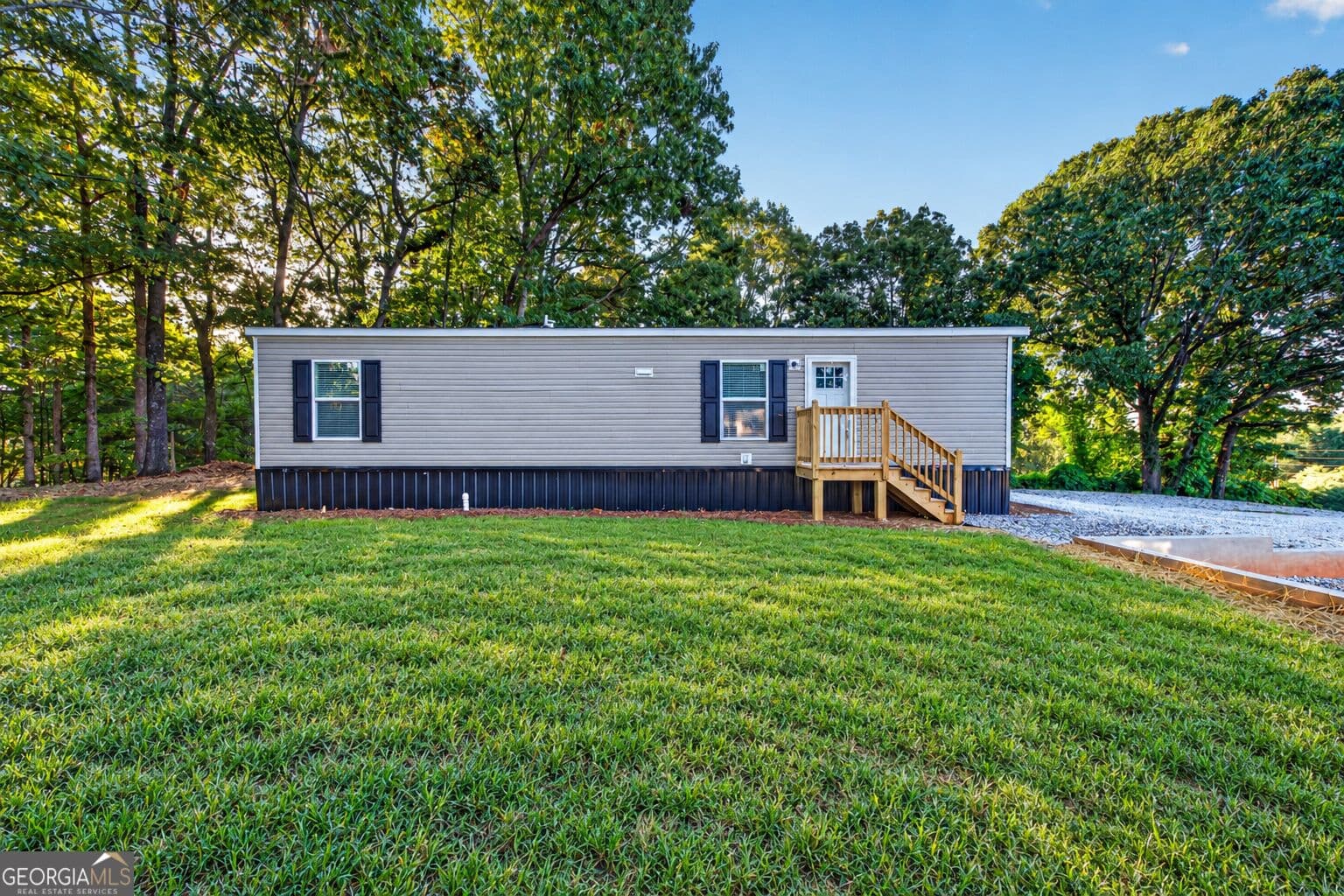 2 bedroom, 1 bathroom, 877 sq ft manufactured home,single family residence for sale at 61 Bennys Drive, Cleveland, GA 30528 — photo 1 of 11