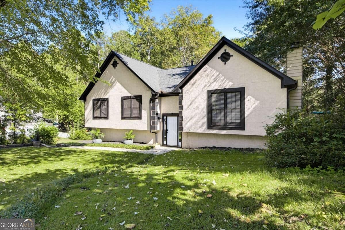 4 bedroom, 2 bathroom, 1,878 sq ft single family residence for sale at 1749 Charrington Way, Powder Springs, GA 30127 — photo 2