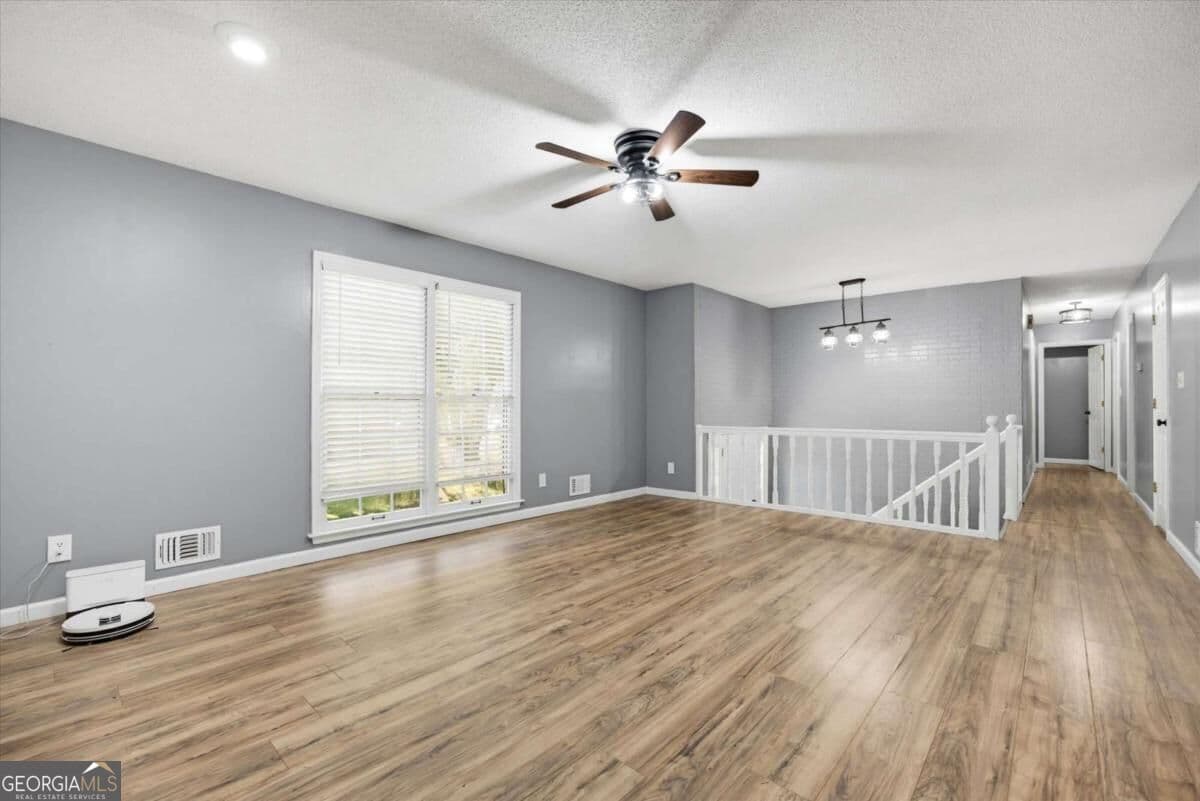 4 bedroom, 2 bathroom, 1,878 sq ft single family residence for sale at 1749 Charrington Way, Powder Springs, GA 30127 — photo 4