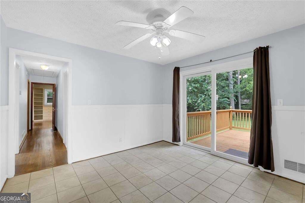 3 bedroom, 2 bathroom, 1,610 sq ft single family residence for sale at 1563 Rockbridge Road, Stone Mountain, GA 30087 — photo 2