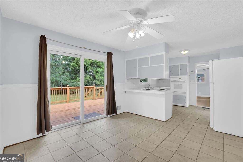3 bedroom, 2 bathroom, 1,610 sq ft single family residence for sale at 1563 Rockbridge Road, Stone Mountain, GA 30087 — photo 3
