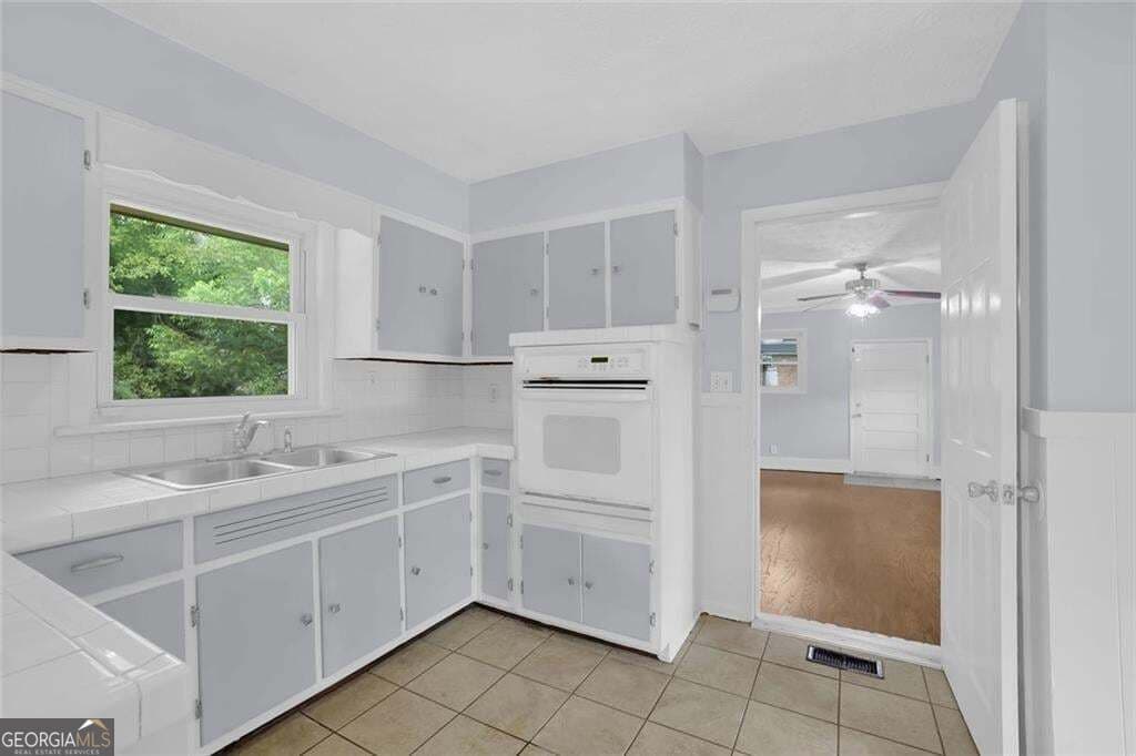 3 bedroom, 2 bathroom, 1,610 sq ft single family residence for sale at 1563 Rockbridge Road, Stone Mountain, GA 30087 — photo 4