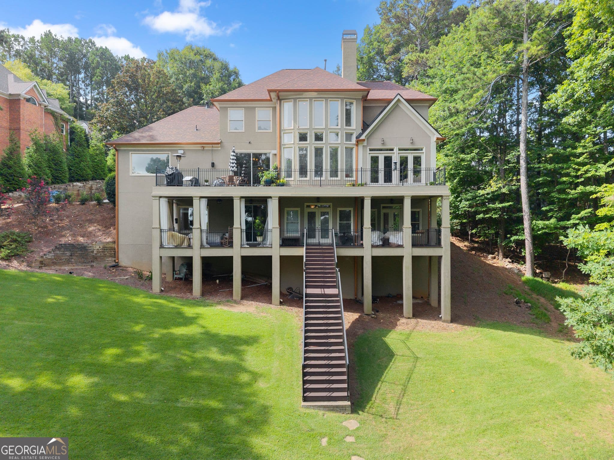 5 bedroom, 5 bathroom, 7,272 sq ft single family residence for sale at 2819 Point Overlook, Gainesville, GA 30501 — photo 2