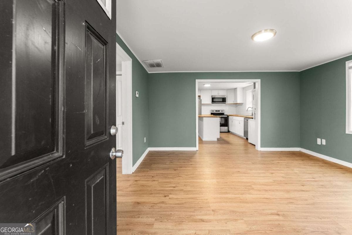 2 bedroom, 1 bathroom, 840 sq ft single family residence for rent at 212 Walker Drive, Monroe, GA 30655 for $1,475 a month — photo 2