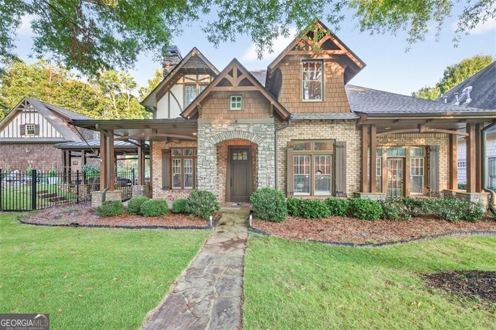 5 bedroom, 5.5 bathroom, 3,905 sq ft single family residence for sale at 5829 Swinging Gate Road, Gainesville, GA 30506 — photo 1 of 125