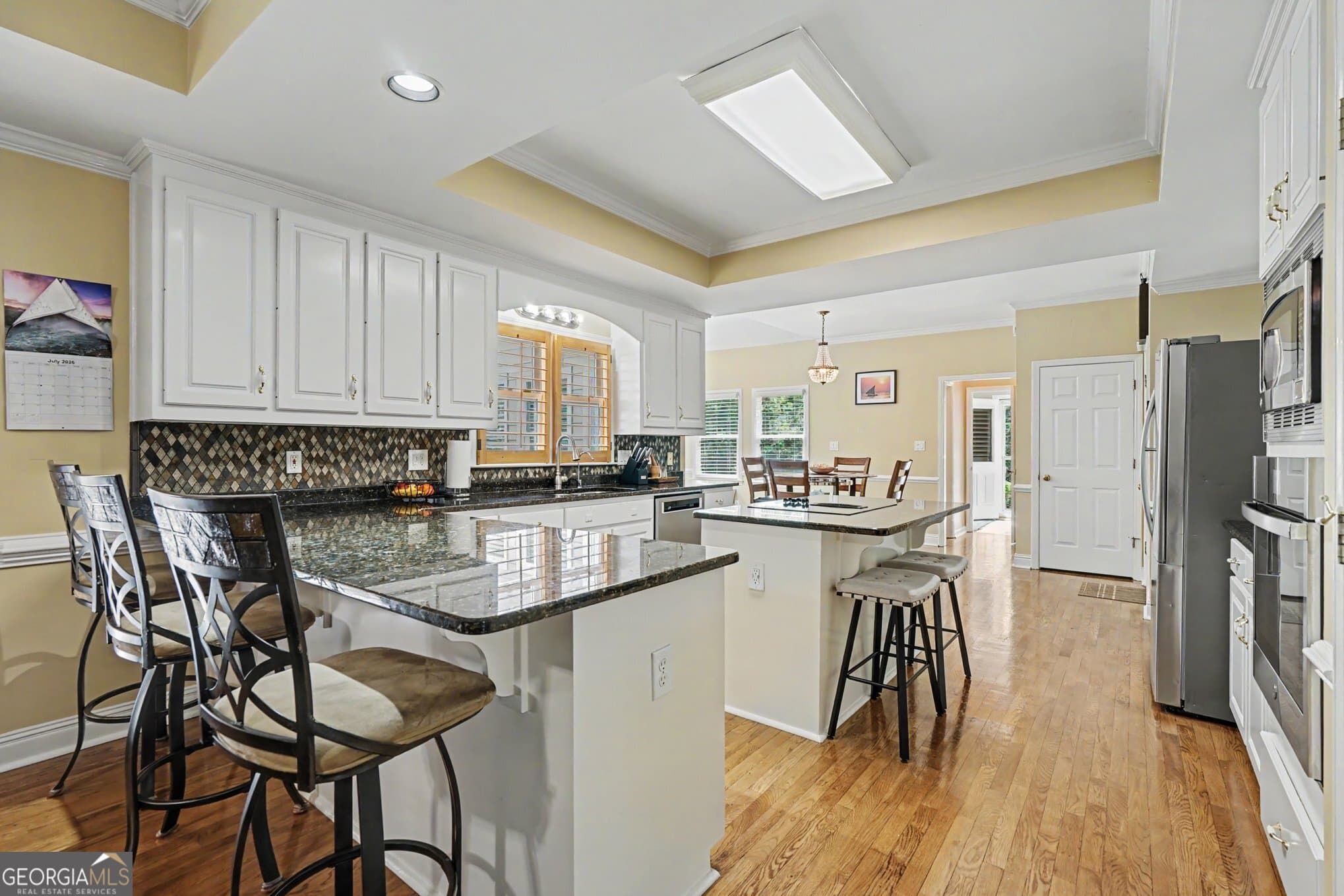 5 bedroom, 4.5 bathroom, 4,206 sq ft single family residence for sale at 4299 Donerail Drive, Snellville, GA 30039 — photo 9