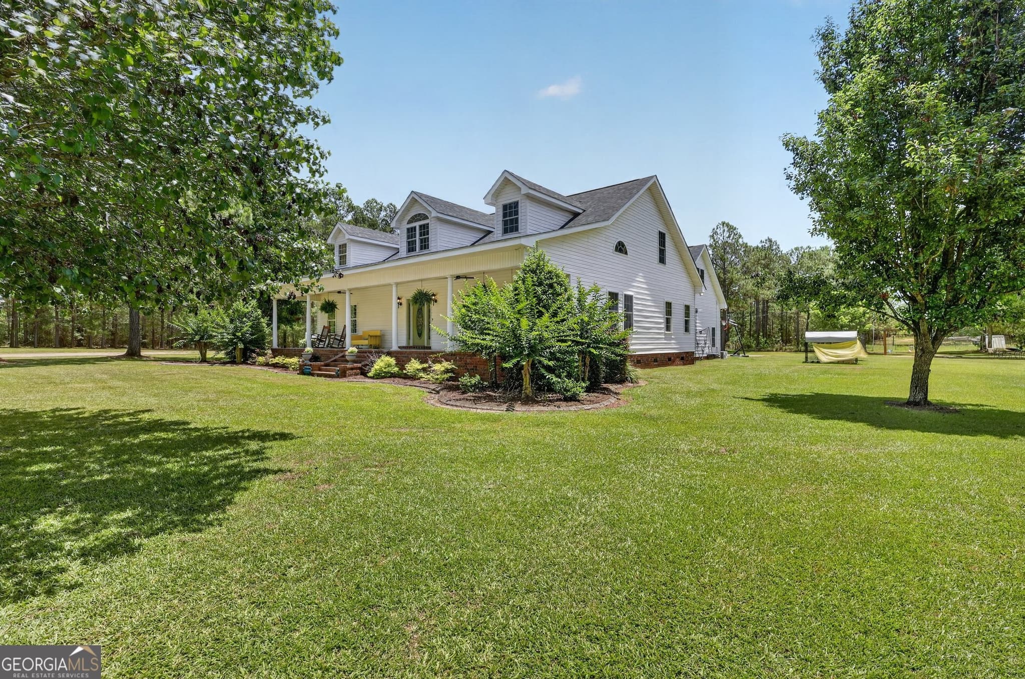4 bedroom, 3 bathroom, 4,297 sq ft single family residence for sale at 300 Johnson Drive, Sylvania, GA 30467 — photo 2