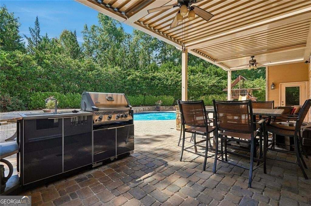 5 bedroom, 4 bathroom, 4,153 sq ft single family residence for sale at 2780 Gatlin Way, Cumming, GA 30041 — photo 5