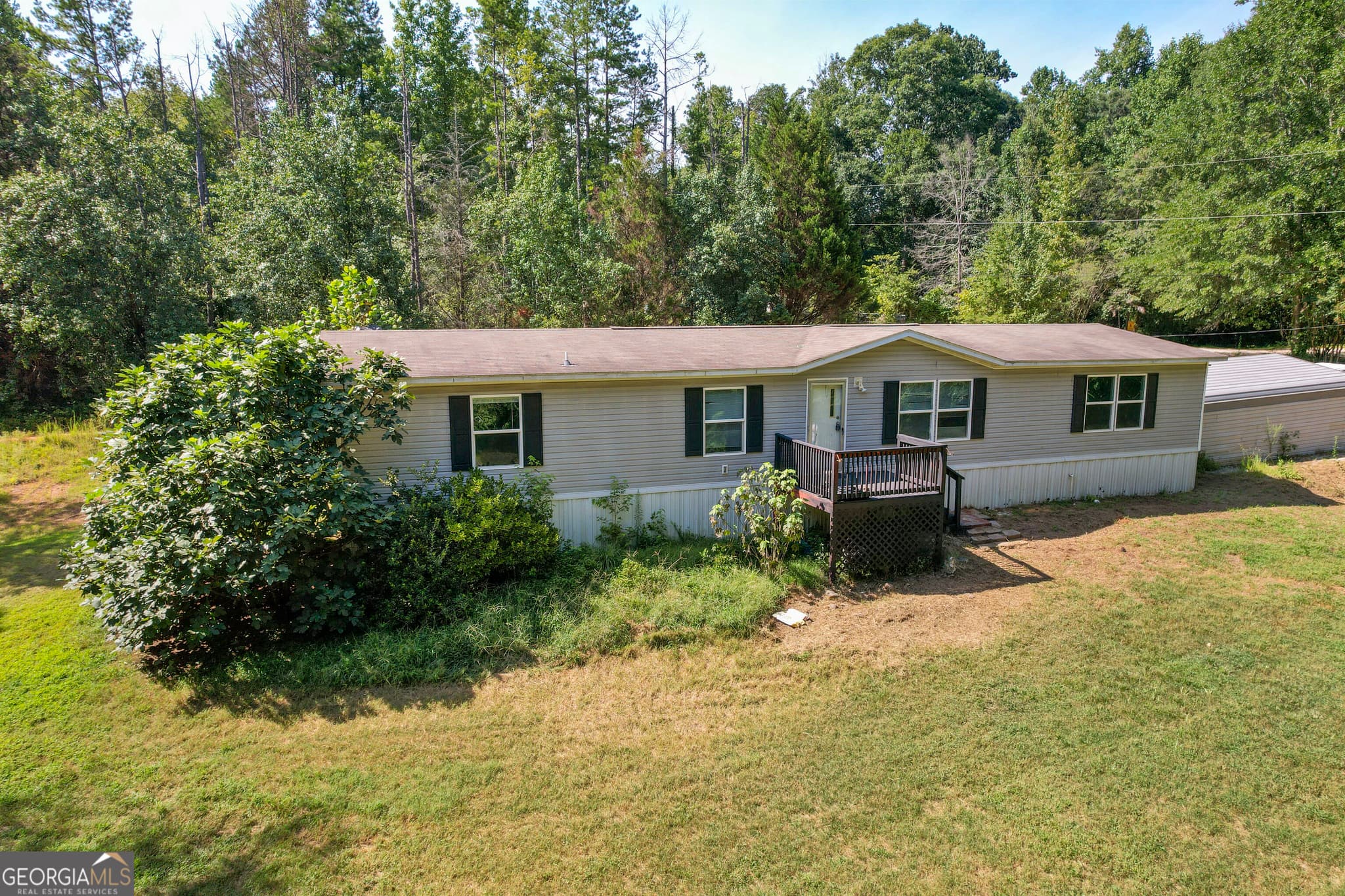 4 bedroom, 2 bathroom, 2,016 sq ft manufactured home,single family residence for sale at 111 Indian Village Drive, Maysville, GA 30558 — photo 4