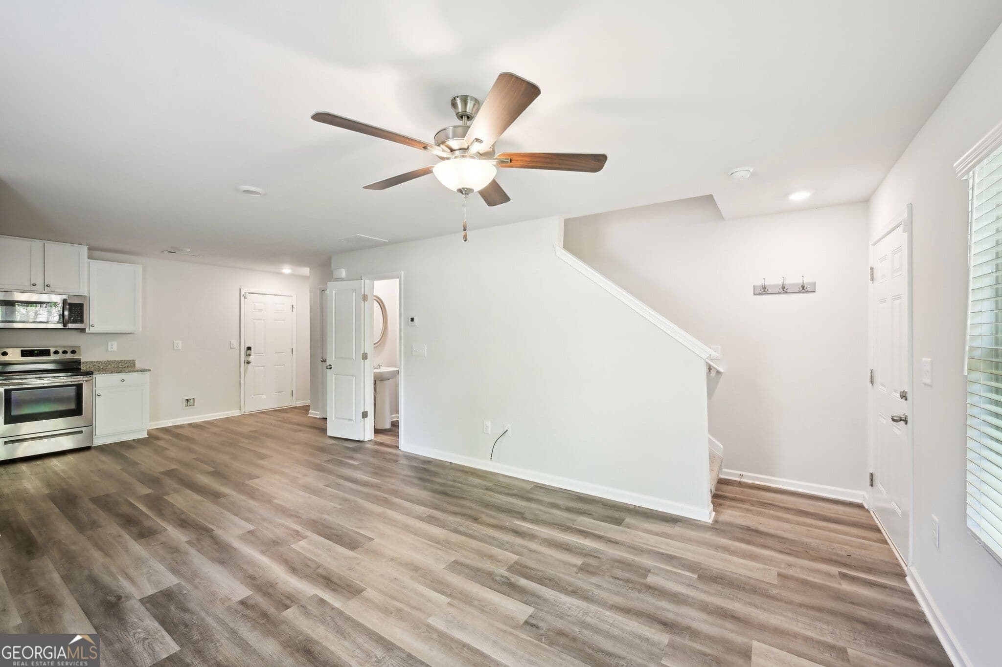 4 bedroom, 2.5 bathroom, 1,670 sq ft single family residence for sale at 4437 Ben Hill Road, Atlanta, GA 30349 — photo 7