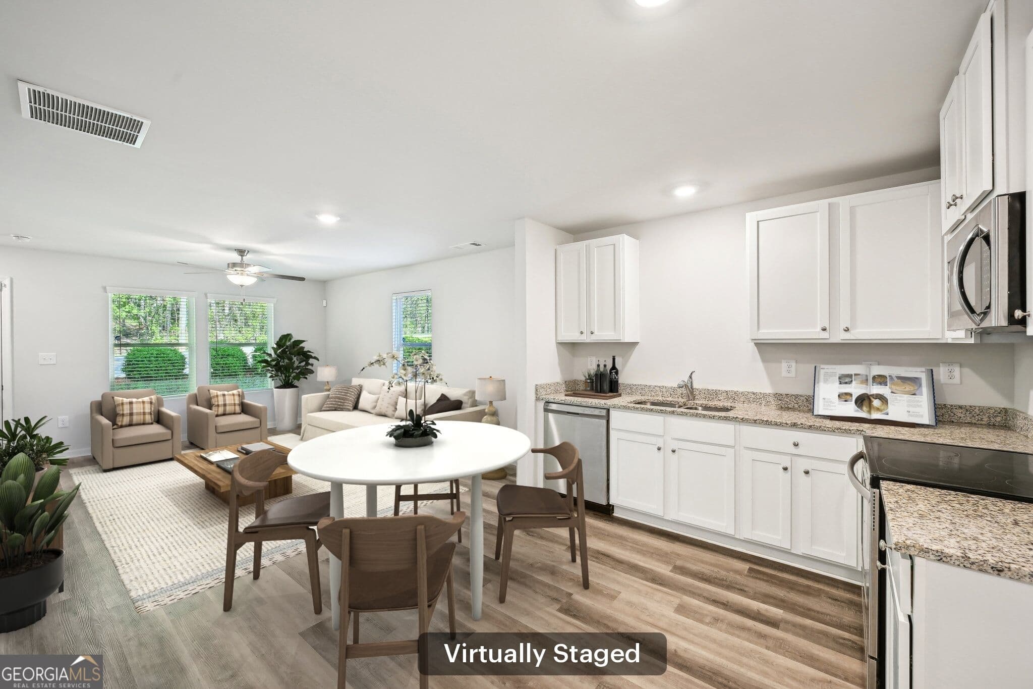 4 bedroom, 2.5 bathroom, 1,670 sq ft single family residence for sale at 4437 Ben Hill Road, Atlanta, GA 30349 — photo 3