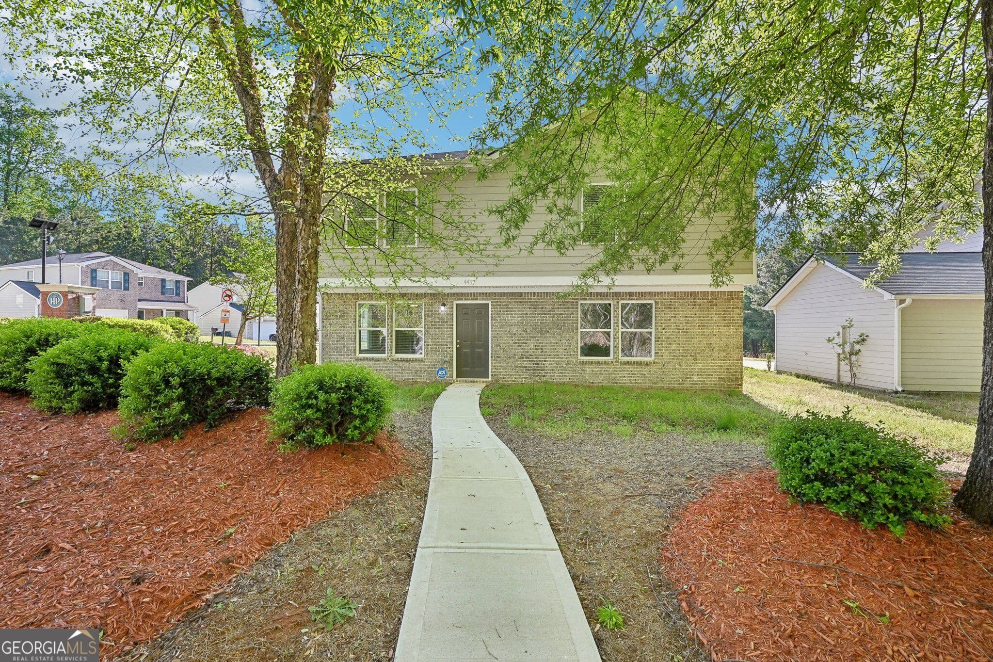 4 bedroom, 2.5 bathroom, 1,670 sq ft single family residence for sale at 4437 Ben Hill Road, Atlanta, GA 30349 — photo 1 of 32