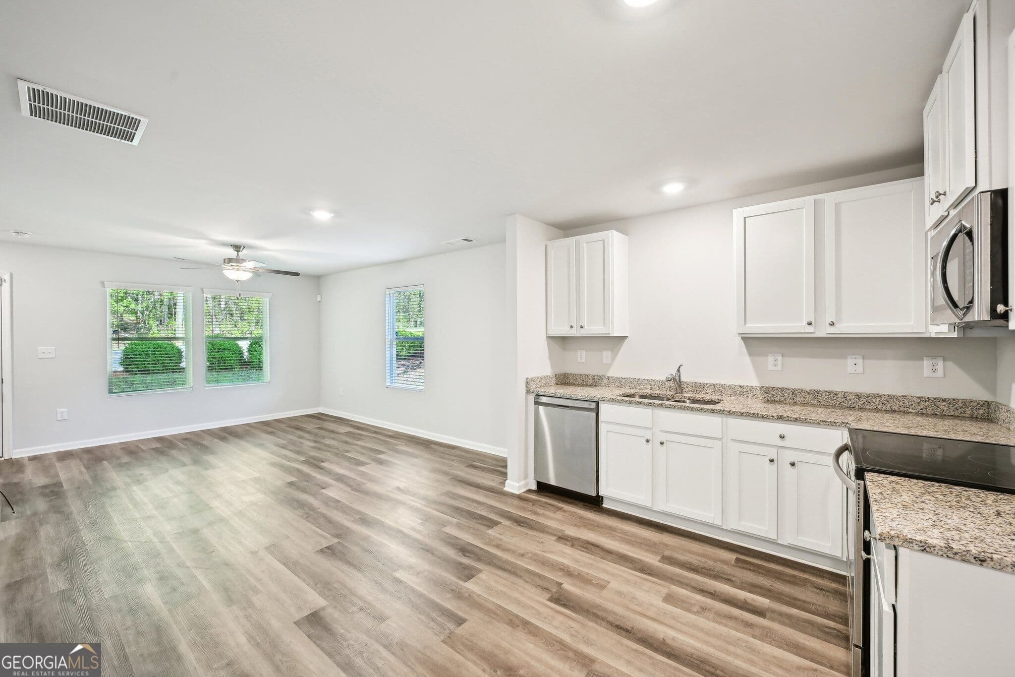 4 bedroom, 2.5 bathroom, 1,670 sq ft single family residence for sale at 4437 Ben Hill Road, Atlanta, GA 30349 — photo 9