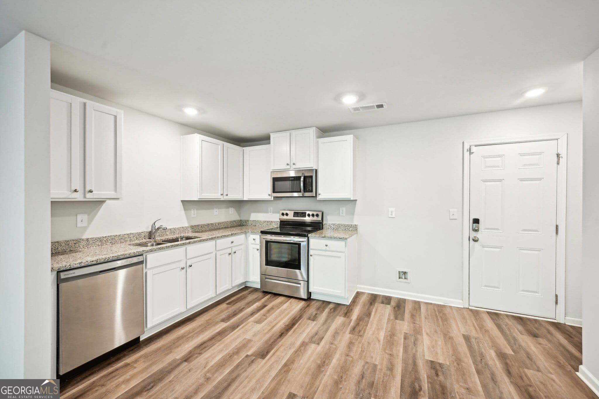 4 bedroom, 2.5 bathroom, 1,670 sq ft single family residence for sale at 4437 Ben Hill Road, Atlanta, GA 30349 — photo 10