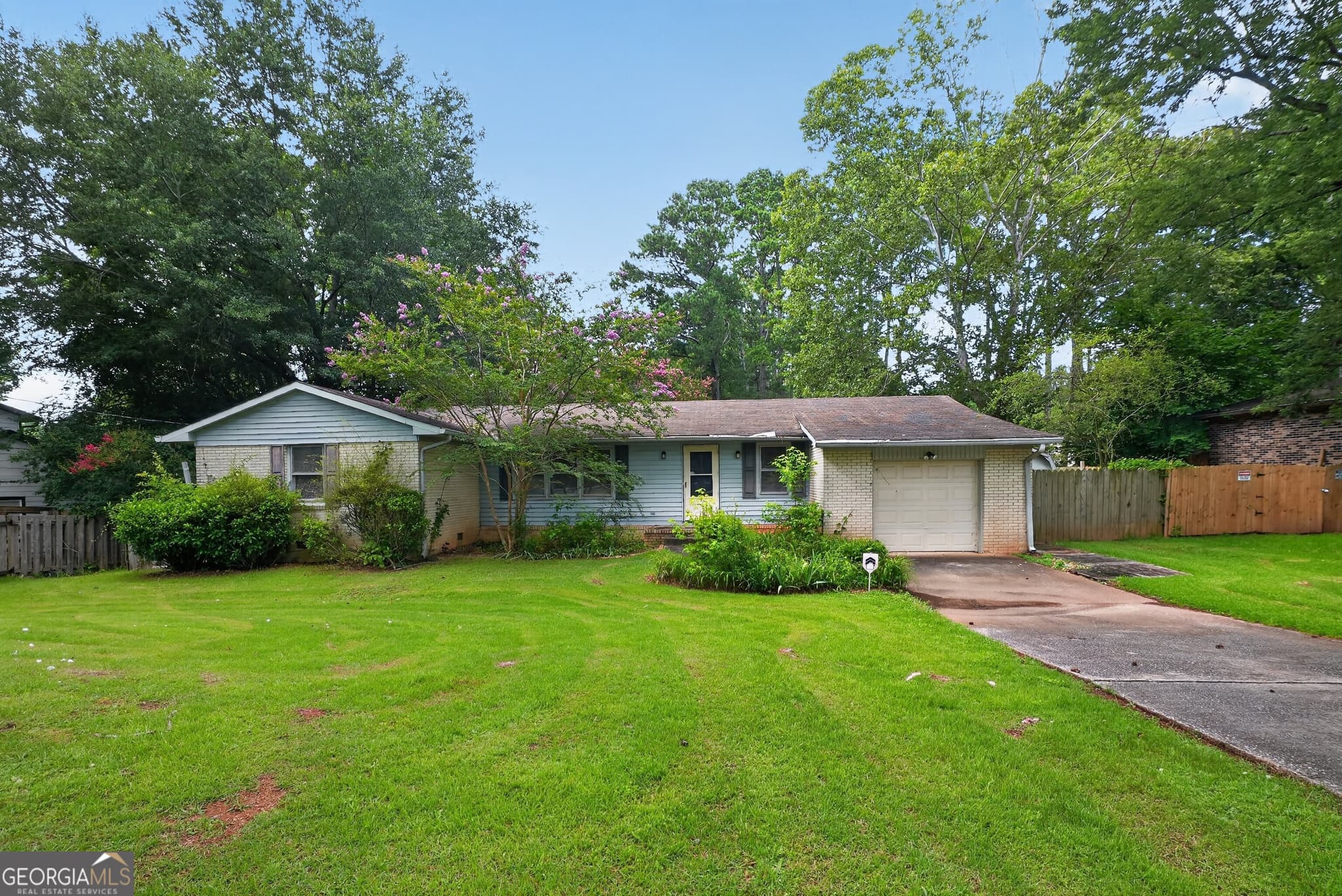 4 bedroom, 2 bathroom, 1,679 sq ft single family residence for sale at 2336 Carnes Road, Jonesboro, GA 30236 — photo 1 of 20