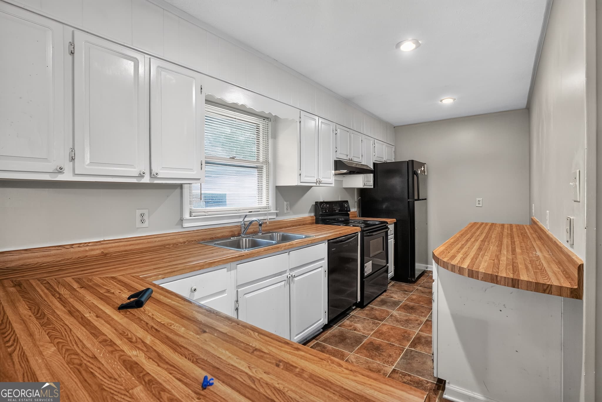 4 bedroom, 2 bathroom, 1,679 sq ft single family residence for sale at 2336 Carnes Road, Jonesboro, GA 30236 — photo 9
