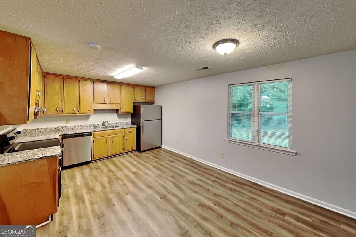 3 bedroom, 2 bathroom single family residence for rent at 25 Mountain Court, Covington, GA 30016 for $1,705 a month — photo 2