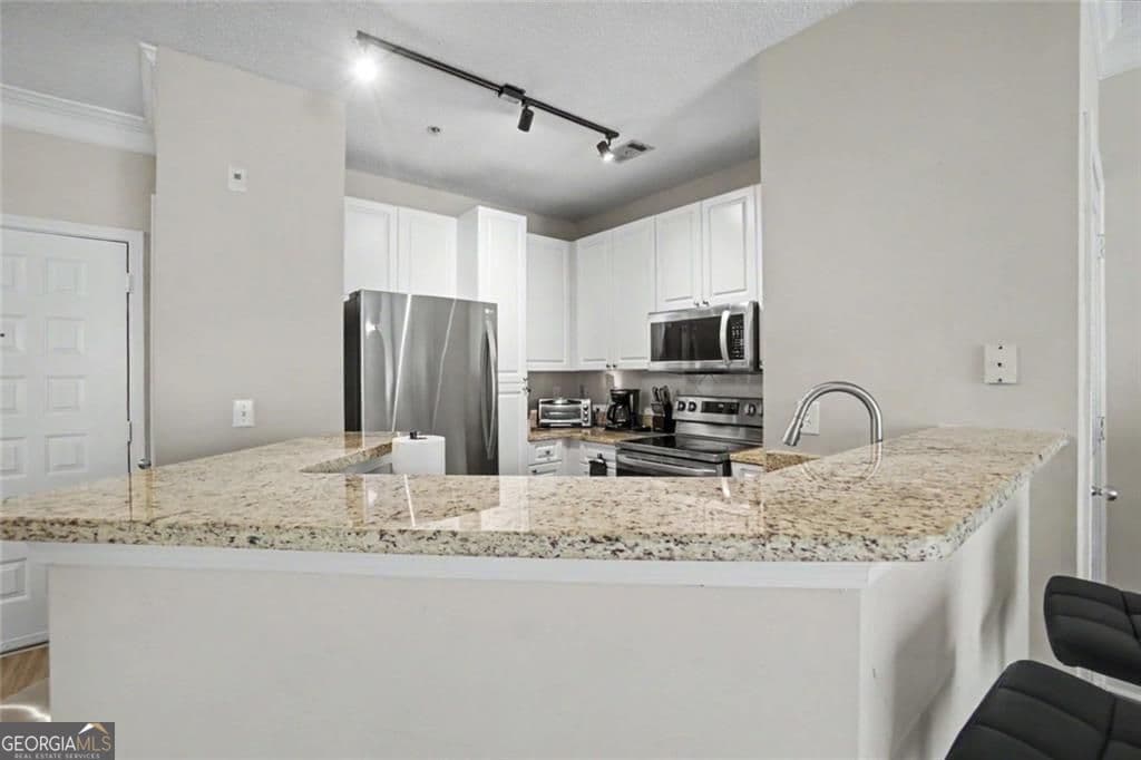 1 bedroom, 1 bathroom, 780 sq ft condominium for sale at 10 Perimeter Summit Boulevard 4409, Brookhaven, GA 30319 — photo 5