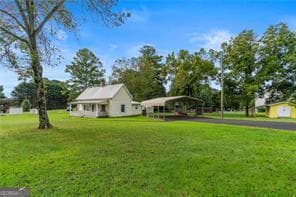 3 bedroom, 1 bathroom, 1,196 sq ft single family residence for rent at 5705 P W A Drive, Cumming, GA 30041 for $1,900 a month