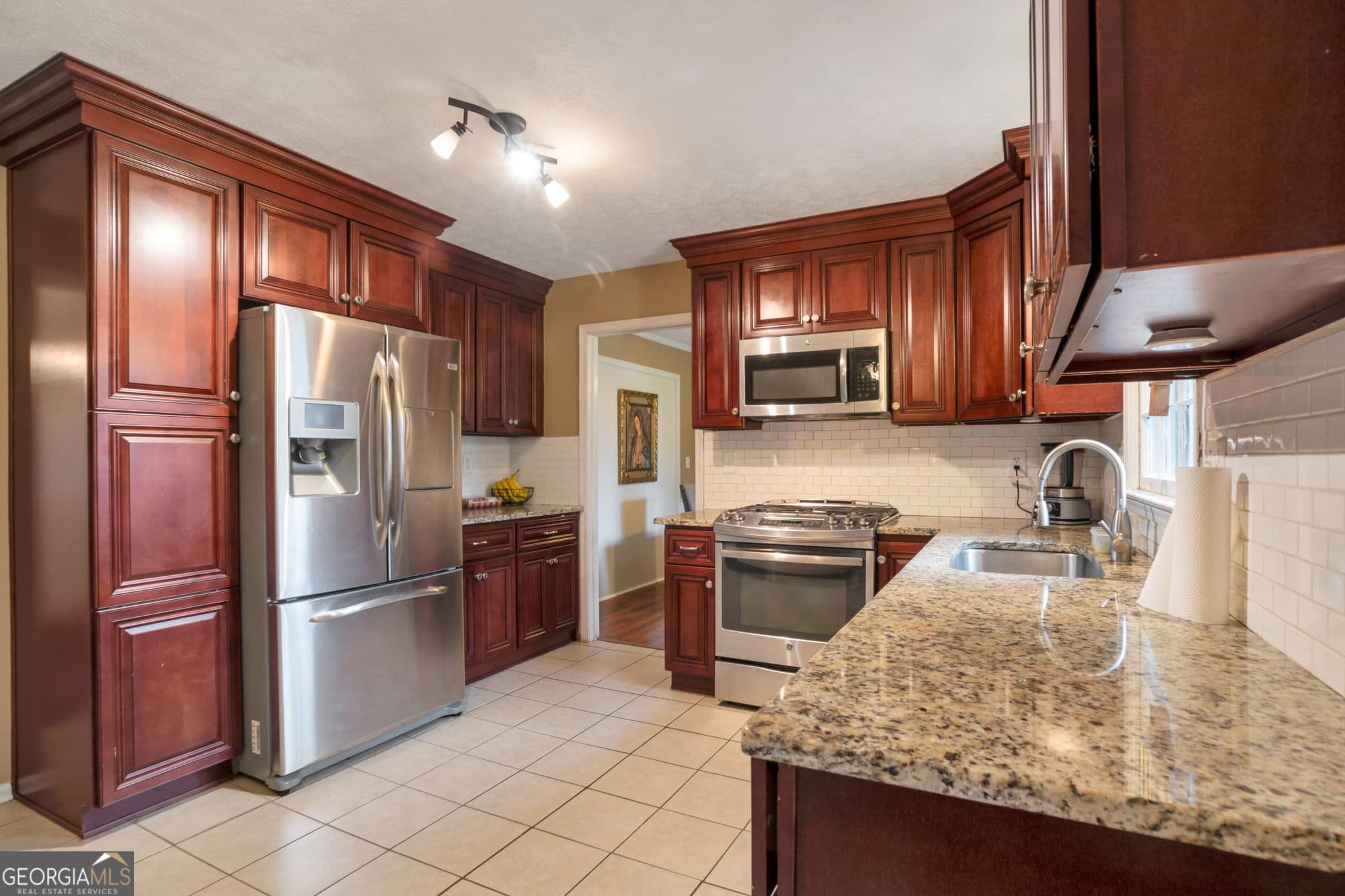 4 bedroom, 2.5 bathroom, 2,274 sq ft single family residence for sale at 1210 Brookside Drive, Conyers, GA 30012 — photo 6