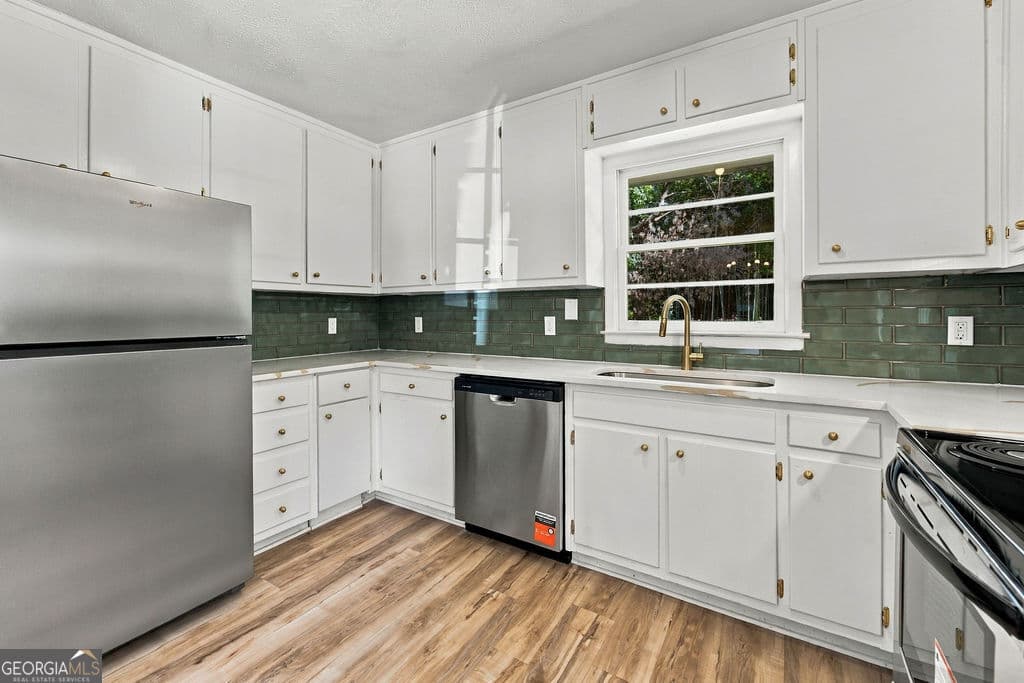 3 bedroom, 1.5 bathroom, 1,175 sq ft single family residence for sale at 5503 Mollie Lane, Mableton, GA 30126 — photo 7