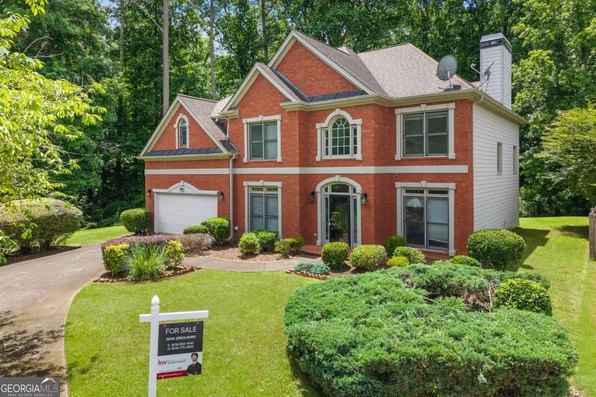 4 bedroom, 2.5 bathroom, 3,063 sq ft single family residence for sale at 1651 Nestle Creek Court, Marietta, GA 30062 — photo 1 of 28